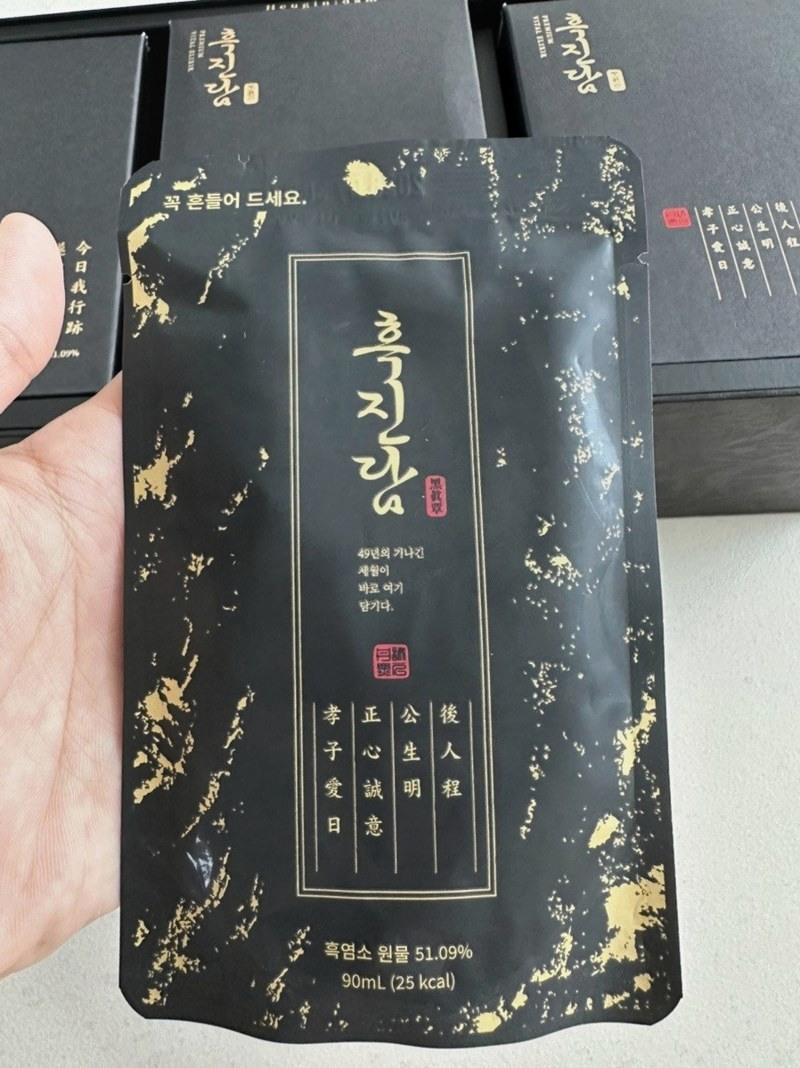 흑진담 파우치 앞면, 흑염소 원물 51.09% 90ml 표기